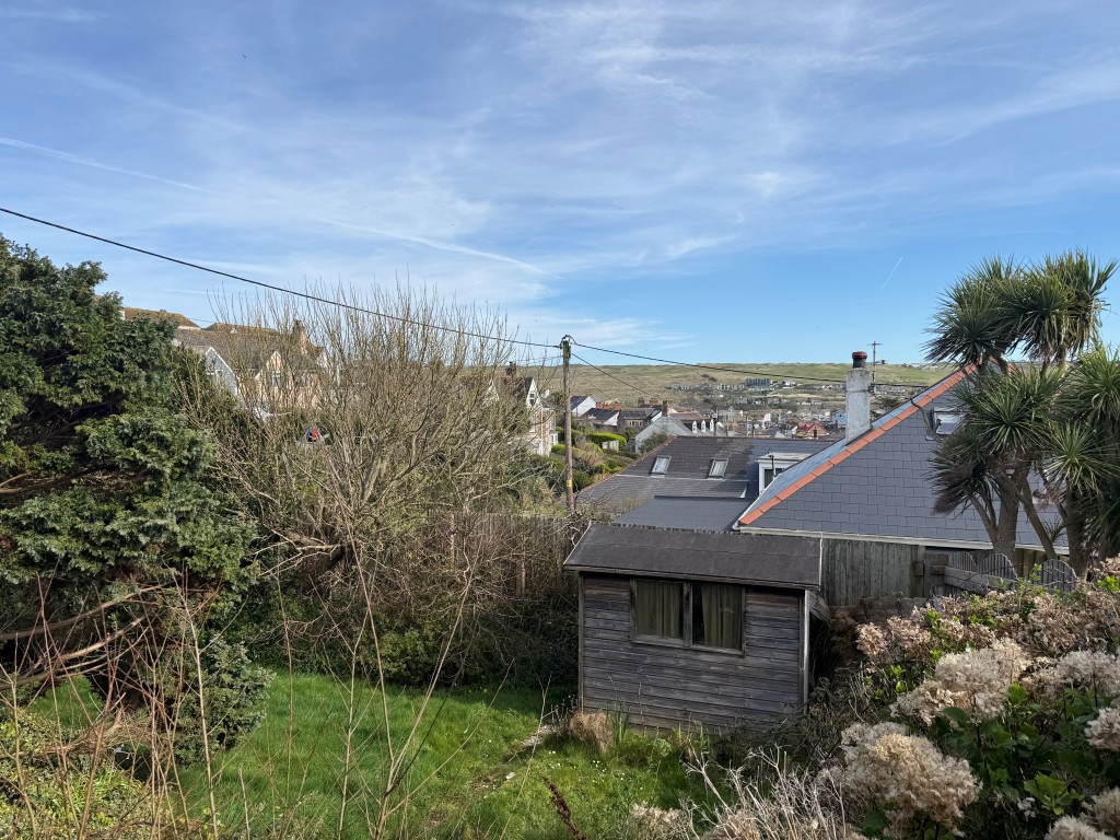 Lot: 123 - DETACHED BUNGALOW FOR UPDATING OR REPLACEMENT - Garden and view taken from front of Bungalow